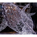 Lumière du motif de sculpture des baleines